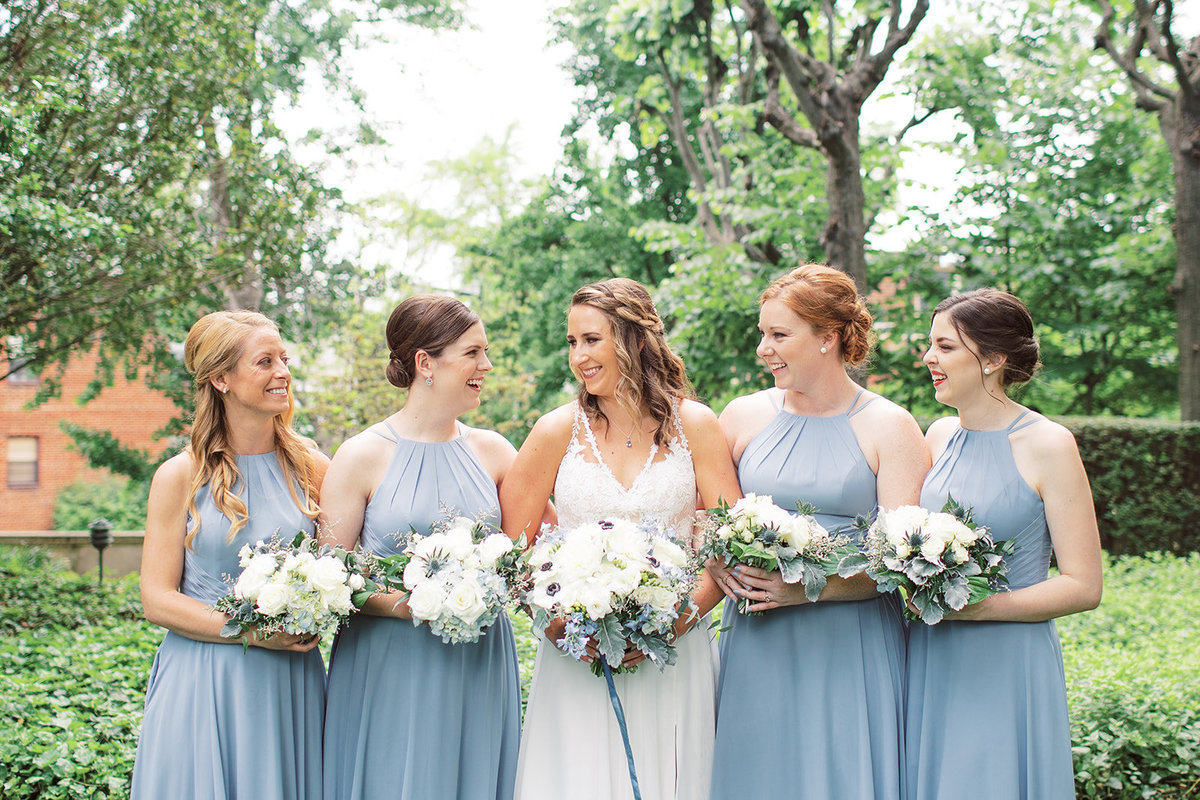 Bride and bridesmaids with bouquets