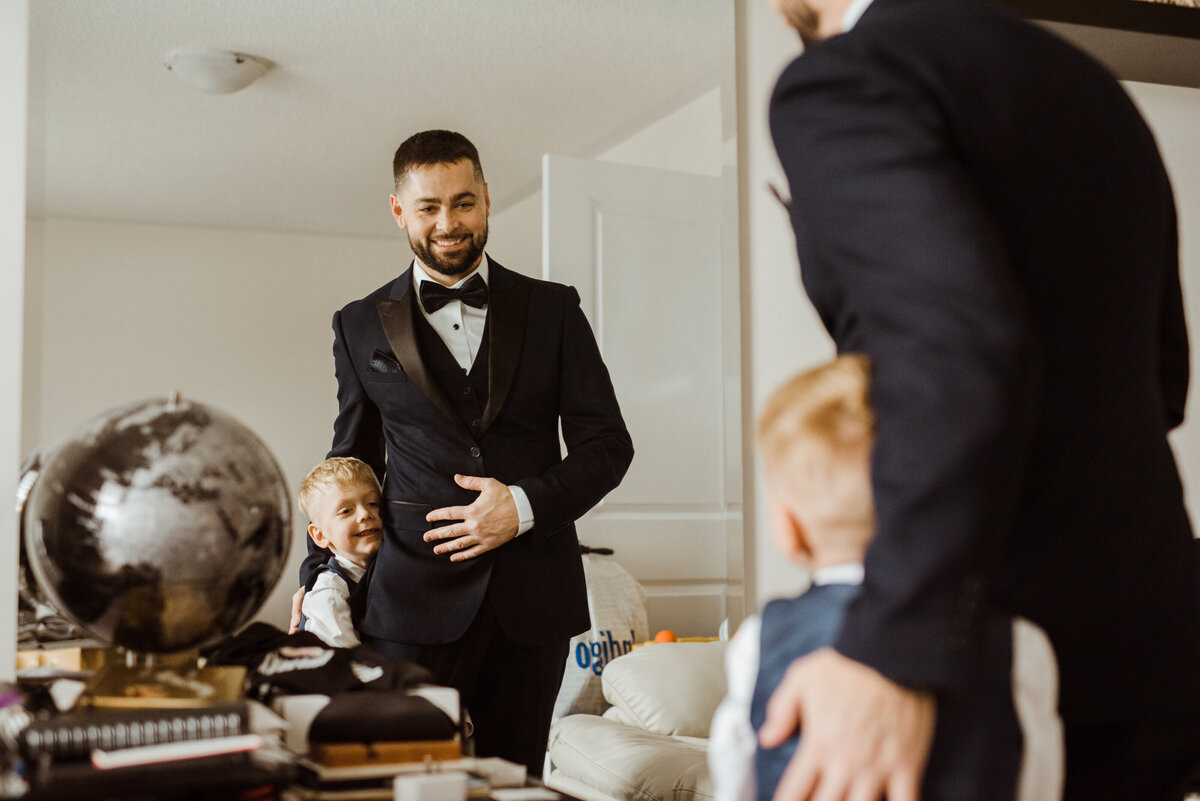 B-markham-home-covid-pandemic-diy-love-is-not-cancelled-wedding-photography-groom-son-getting-ready-11