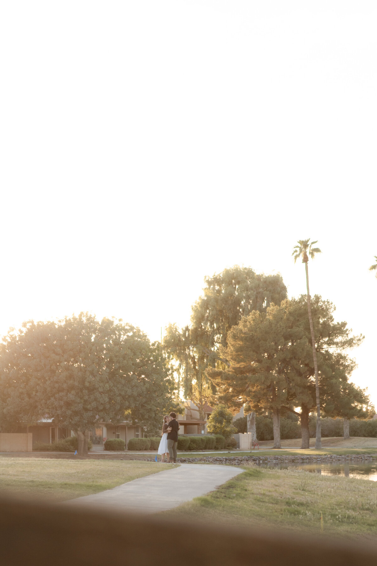 Jovanna G Photography. Classic, sophisticated Wedding Photos. Soft romantic engagement photos. Soft romantic WeddingPhotos. Sophisticated Wedding Photographer. Professional Wedding Photographer. Destination Wedding Photographer. Luxury Wedding photographer. Traveling Wedding Photographer. AZ Wedding Photographer. Gilbert AZ Wedding Photographer. Queen Creek Wedding Photographer. Phoenix Wedding Photographer. Scottsdale Wedding Photographer. Flagstaff Wedding Photographer. SoCal Wedding Photographer. California Wedding Photographer. Northern California Wedding Photographer. Southern California Wedding Photographer. San Francisco Wedding Photographer. Bay Area Wedding Photographer. San Jose Wedding Photographer. Golden Gate Bridge Wedding Photographer. Beach Lover Wedding Photographer. Palace of the Fine Arts Wedding Photographer. Ocean Lover. I love California. Orange County Wedding Photographer. Newport Beach Couples Photographer. Newport Beach Wedding Photographer. Laguna Beach Couples Beach Engagement Photographer. Laguna Beach wedding beach photographer. Los Angeles Wedding Photographer. Young and in love engaged couples who live in southern California. Christian Young Couple. Young Engaged Couple. Engaged High School Christian Couple. Christian Values. Young conservative Christian women. Young Conservative Christian men. Young Conservative Christian Couple. Young Christian Couple Engaged in High School. Young Christian College Couple. Lakeside Lovers in the Autumn Sun. David & Grace - engagement photos. Jovanna G Photographer Engagement Photos. Arizona sun shining through autumn trees- engagement. Chandler, AZ Engagement Photos. Chandler, AZ 2026 bride. Chandler, AZ Wedding Photographer. Chandler, AZ Young Engaged Couple. Girl in her 20s. Engaged Arizona Girl in her 20s. Lakeside Engagement photos. AZ Lakeside Engagement Photos. AZ Weeping Willow Lakeside Proposal. Arizona Lakeside Proposal with weeping willow tree. Detail shot of engagement ring on Arizona Lakeside estate. Chandler, AZ Lakeside Estate Proposal Outfit Inspiration.