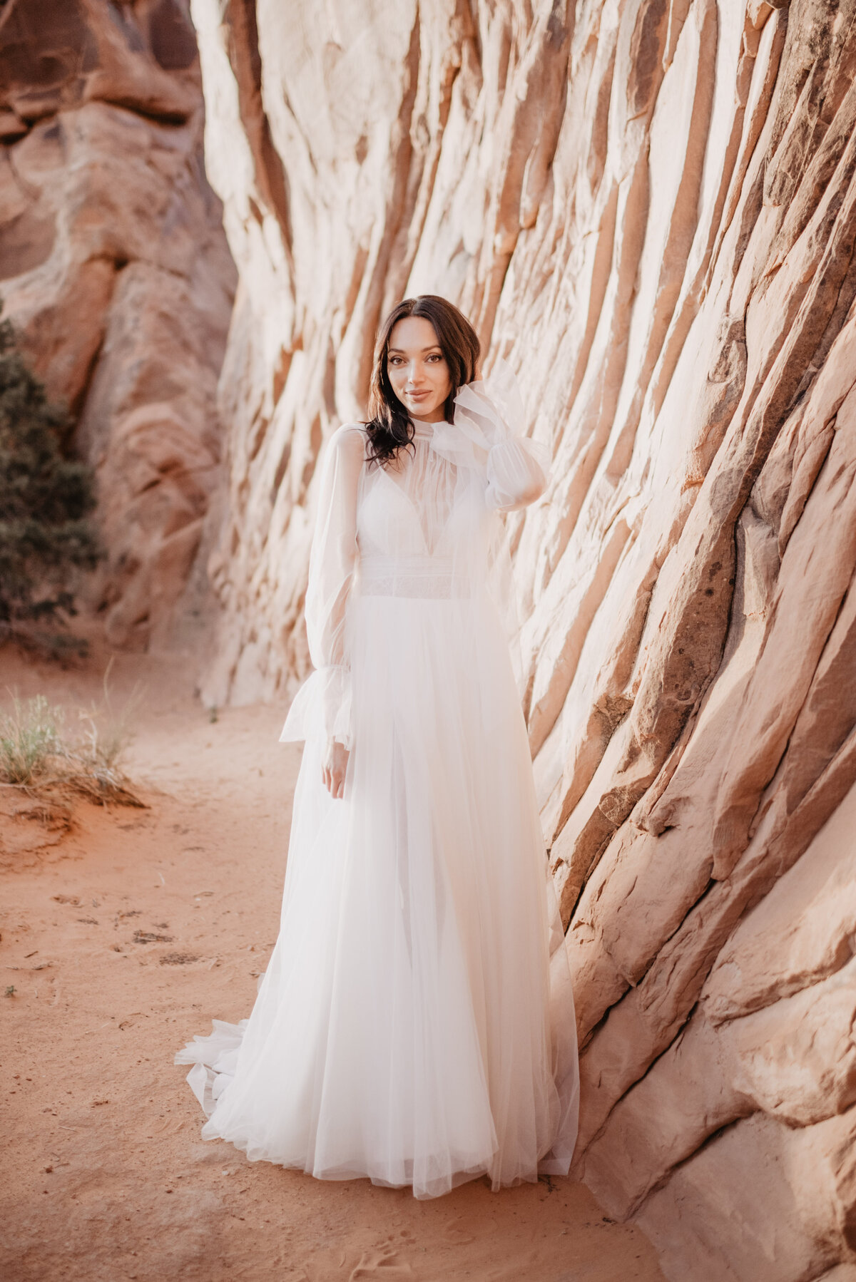 Utah elopement photographer captures bride wearing trendy wedding dress