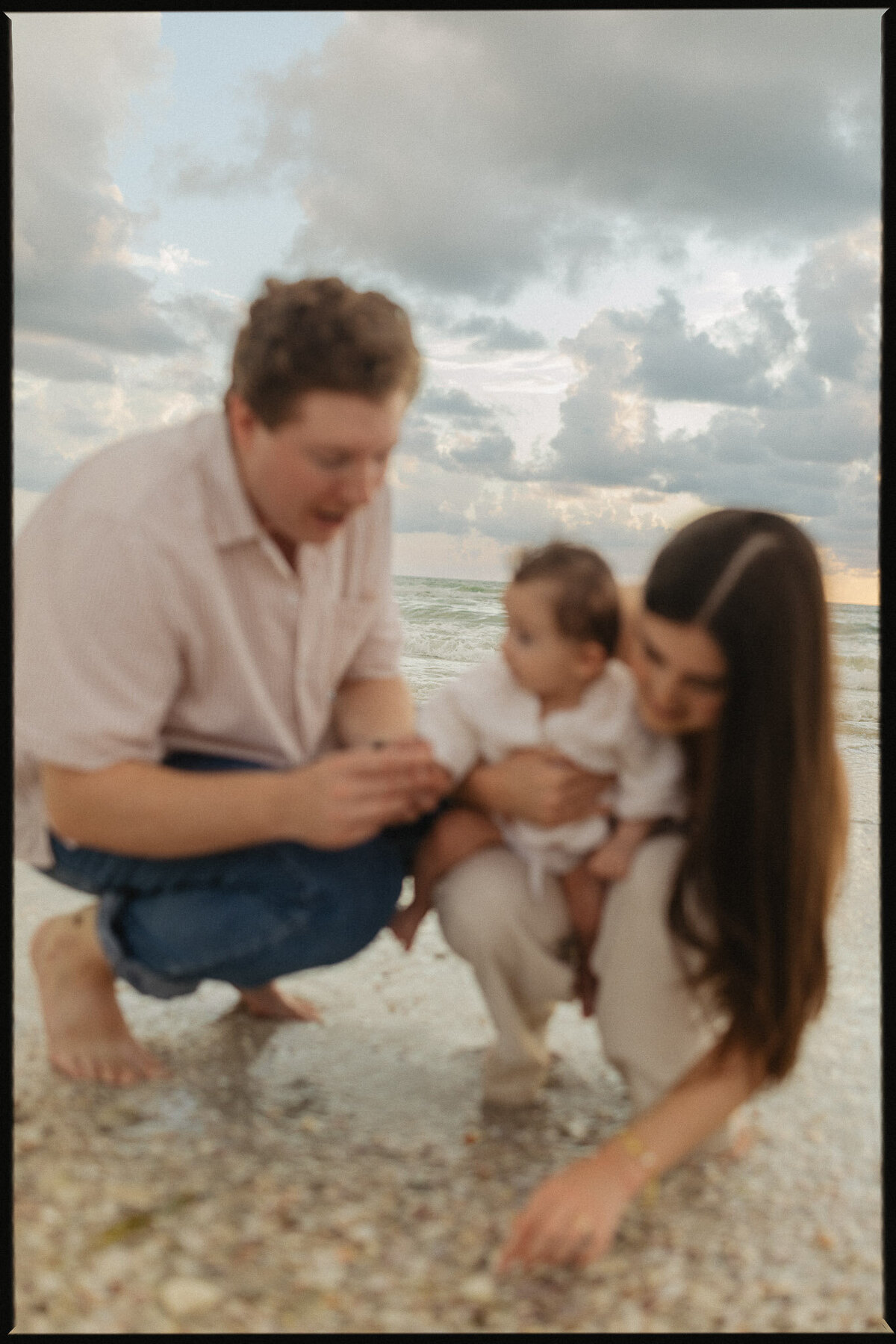Searching for seashells with baby