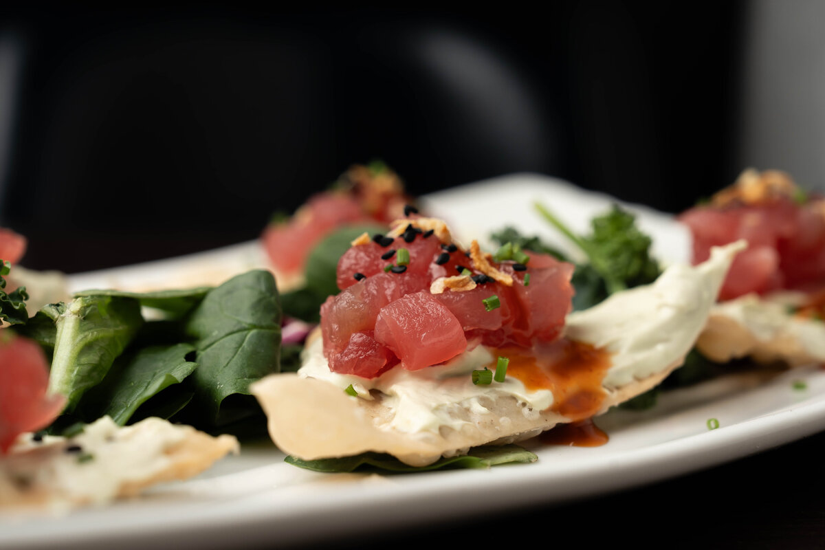 tuna tartare on a white appetizer dish