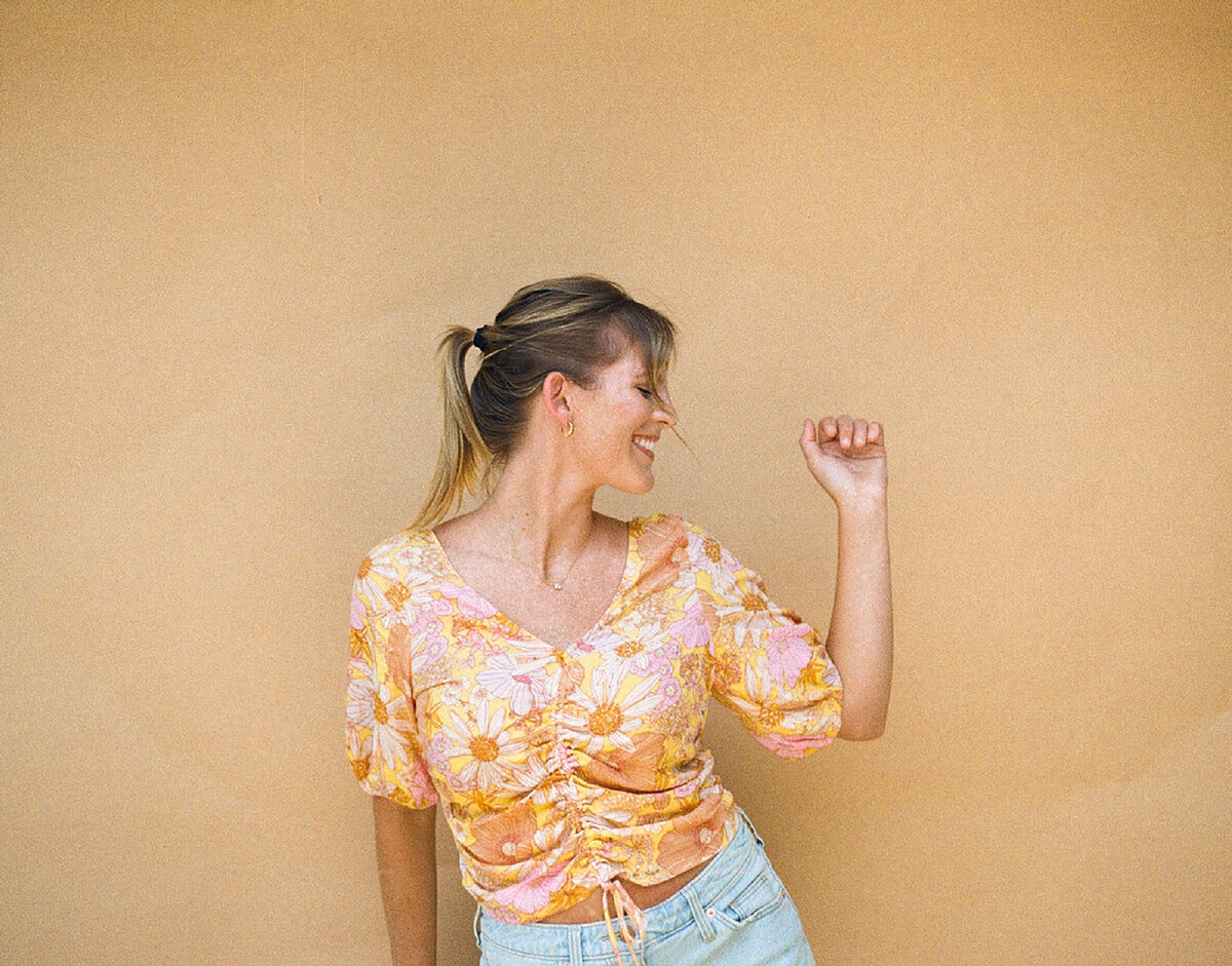 erin smiling in floral top