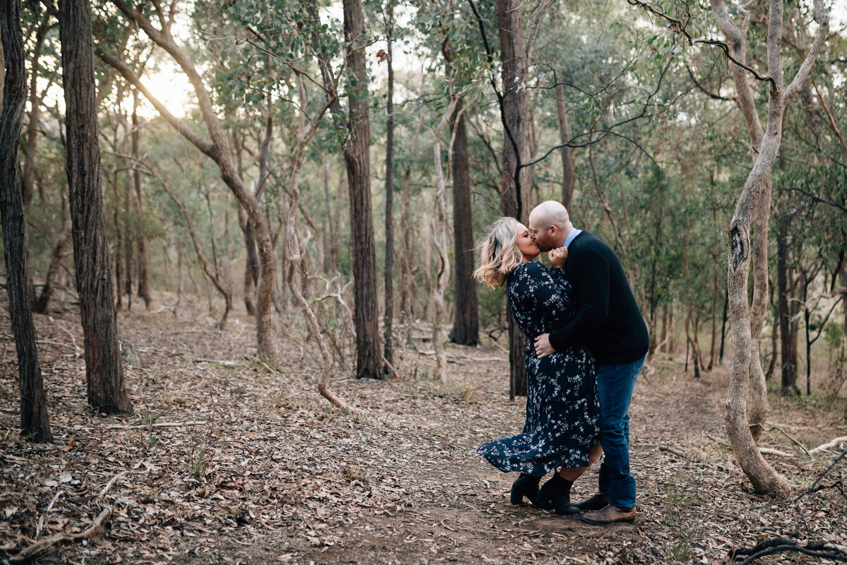 Man and woman dancing and kissing outside in bushland. Couples photography Melbourne, And So I Don’t Forget Photography