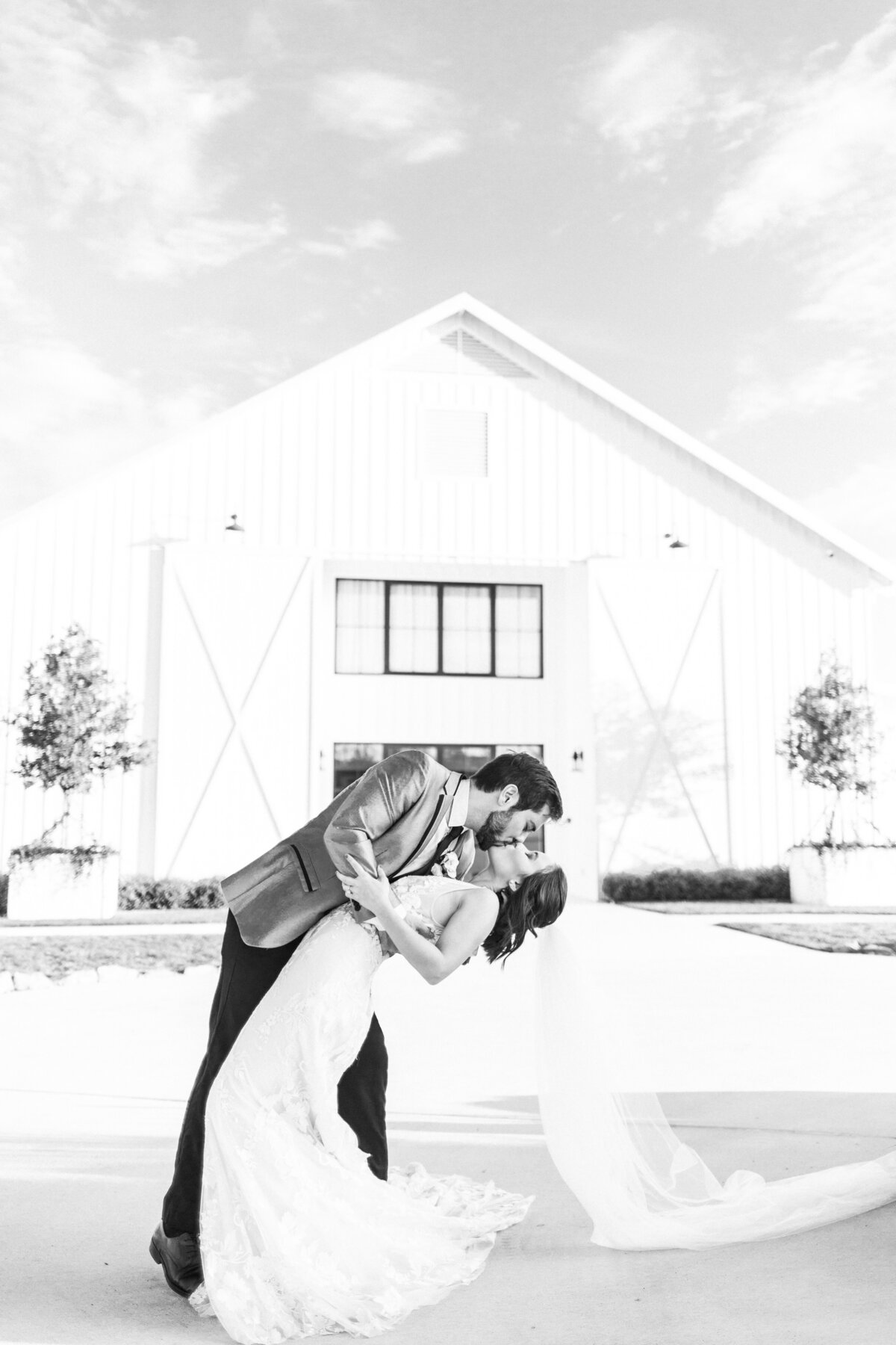 An Outdoor Black and White Couples' Portrait at The Farmhouse