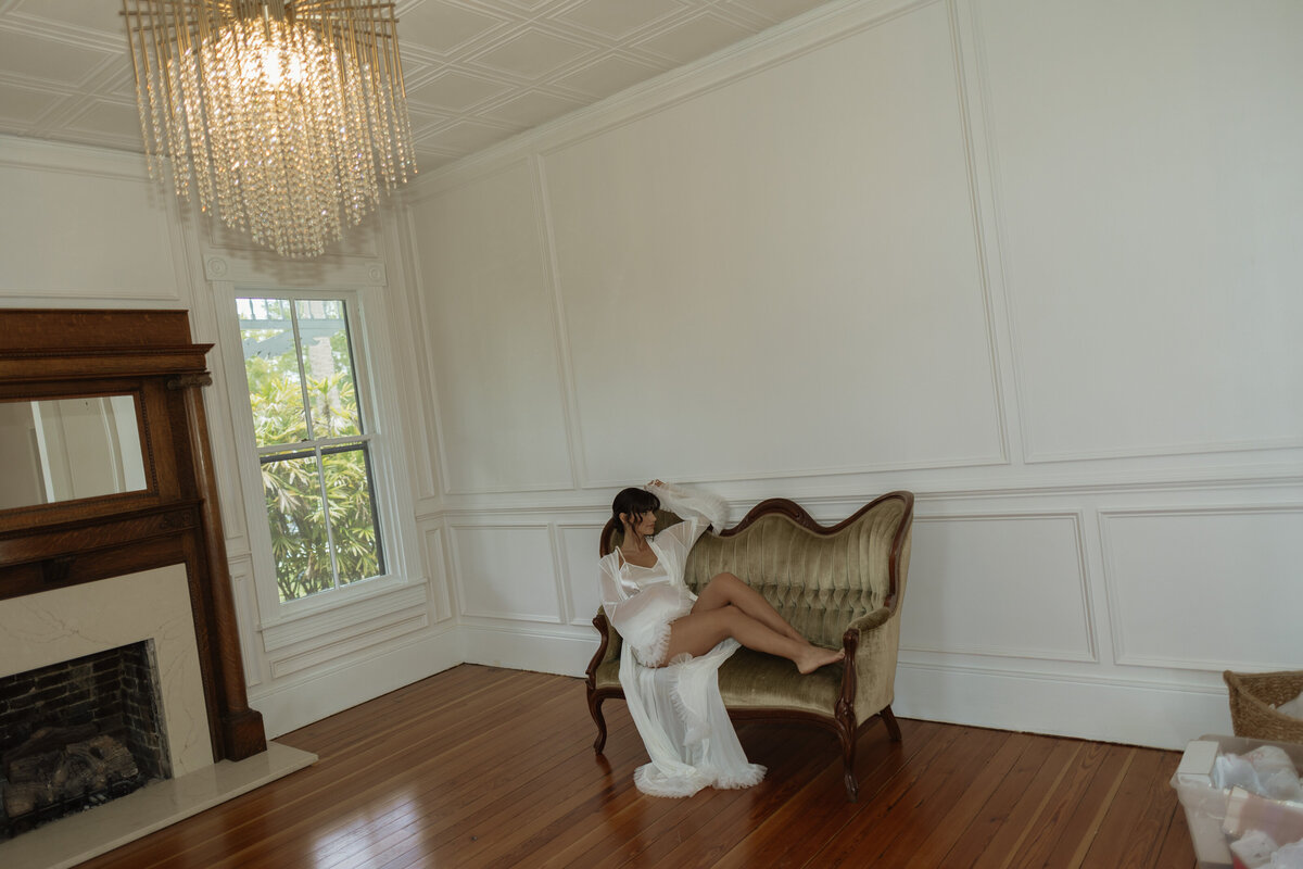 Luxury Florida wedding surrounded by tall palm trees and tropical details at The Palm Mansion in Umatilla