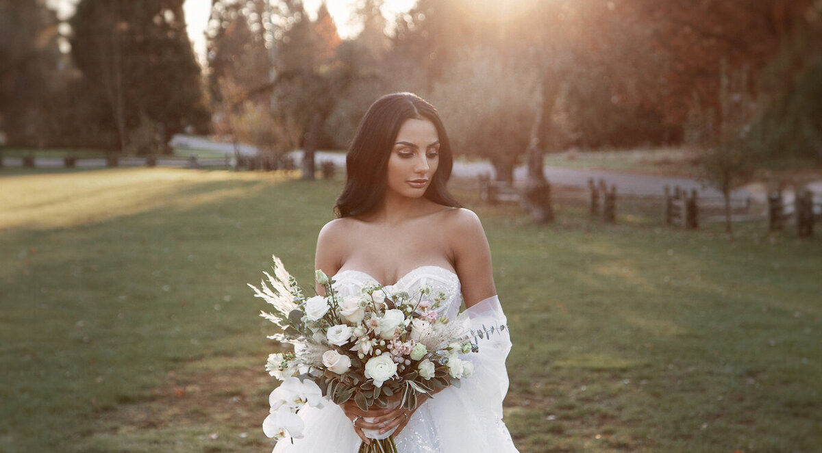 bride posed with flowers