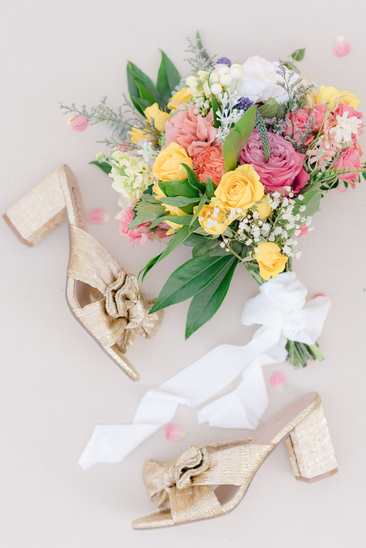 gold-shoes-with-wedding-bouquet
