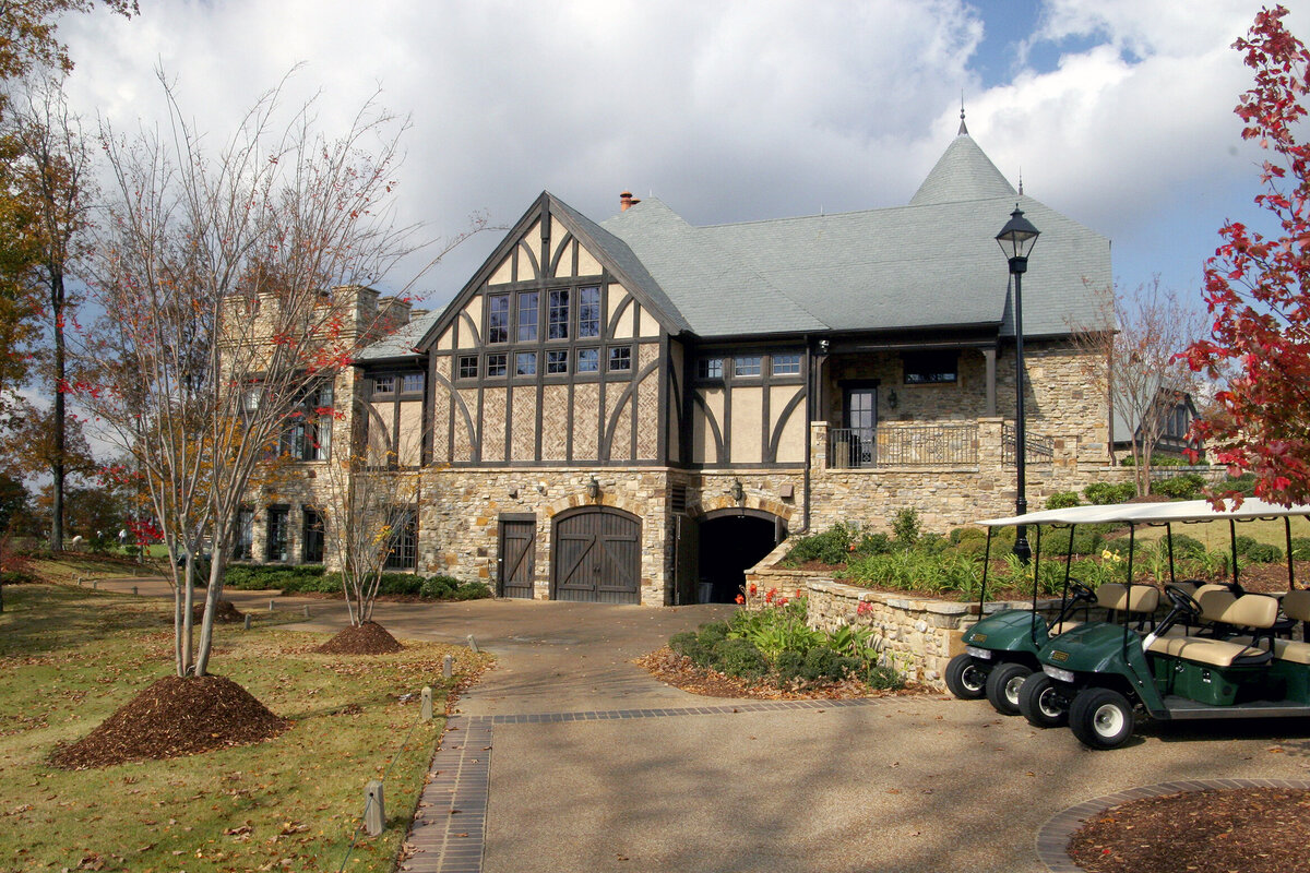 side view of the clubhouse with golf carts at The Ledges country club