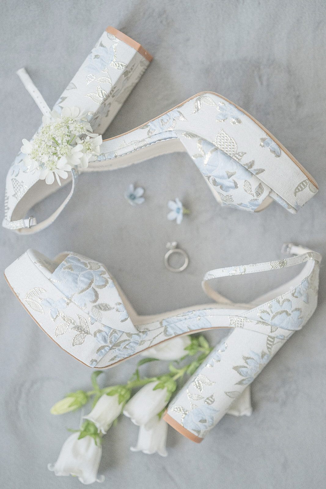 Blue-floral-bridal-shoes-white-flowers
