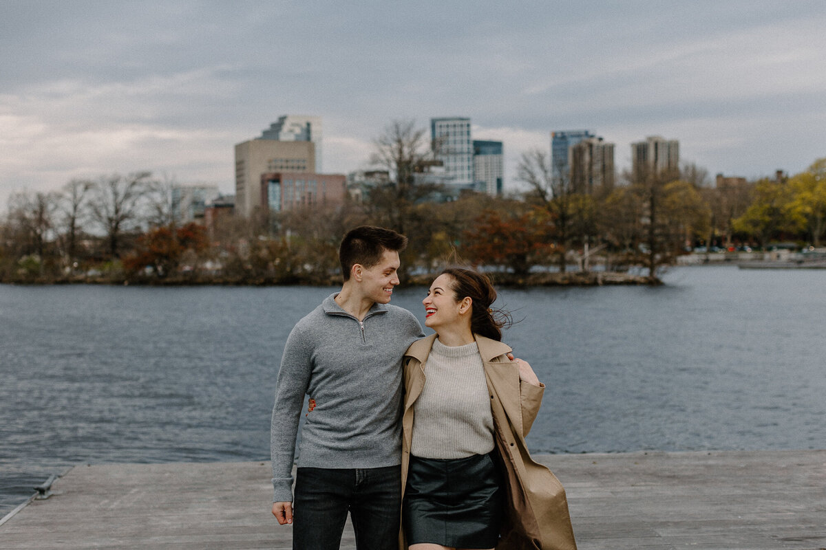couple walking on esplanade in boston