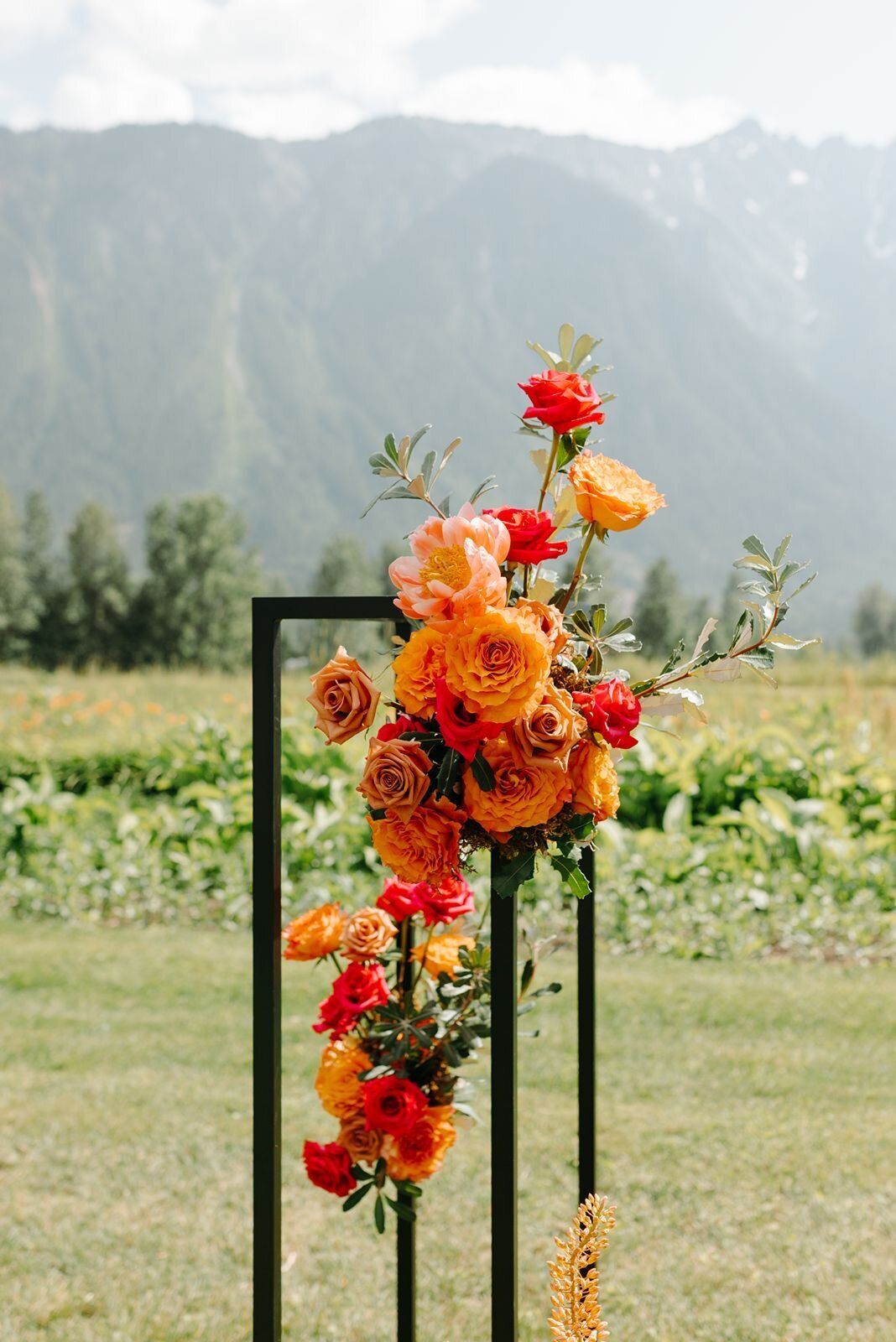 Orange floral wedding ceremony  decor