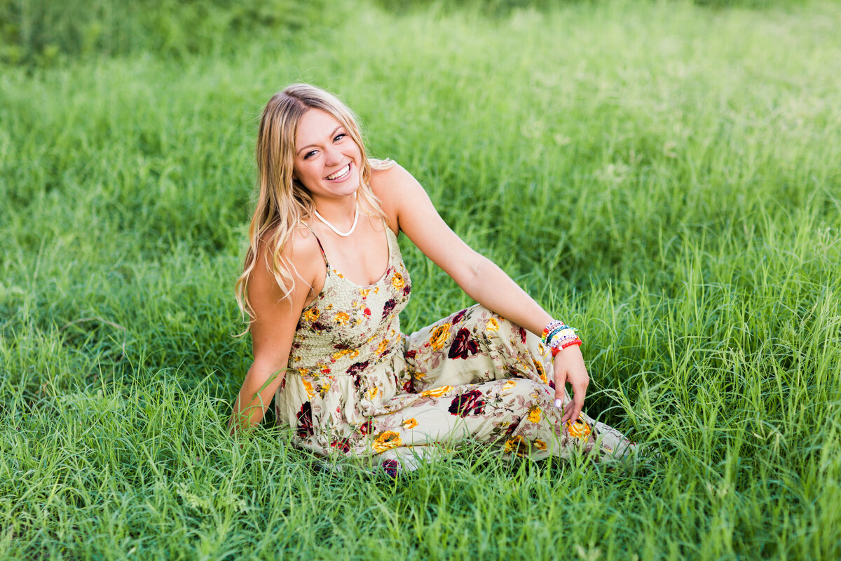 high school senior girl poses for senior photography session