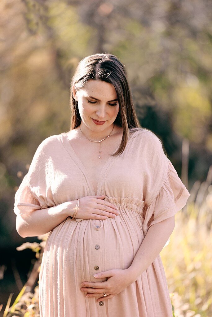 mom who is expecting in pink