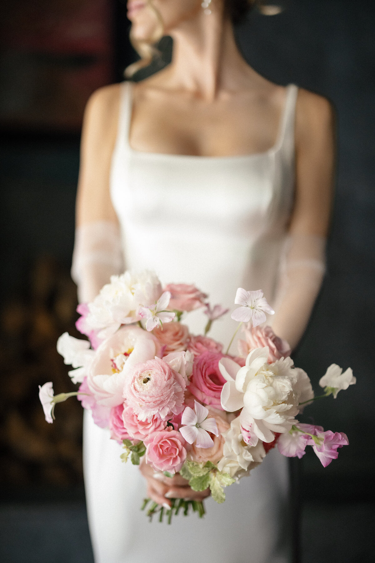 pink bridal bouquet held by bride