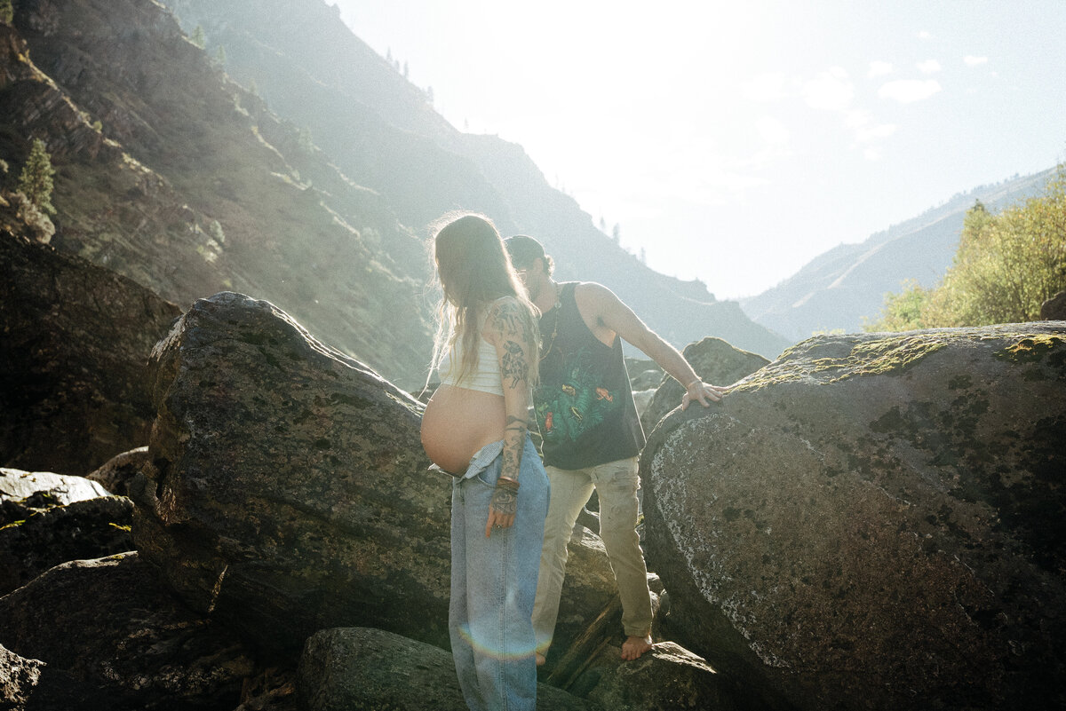 Couple during golden hour engagement and maternity shoot in Riggins, Idaho wedding/elopement - photographed by The Storytellers
