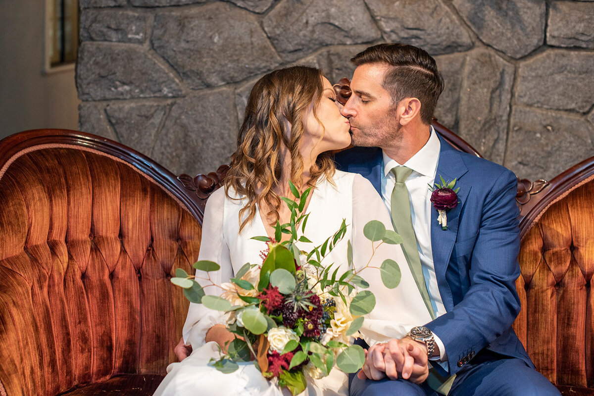 Wedding couple kissing at Homewood Asheville