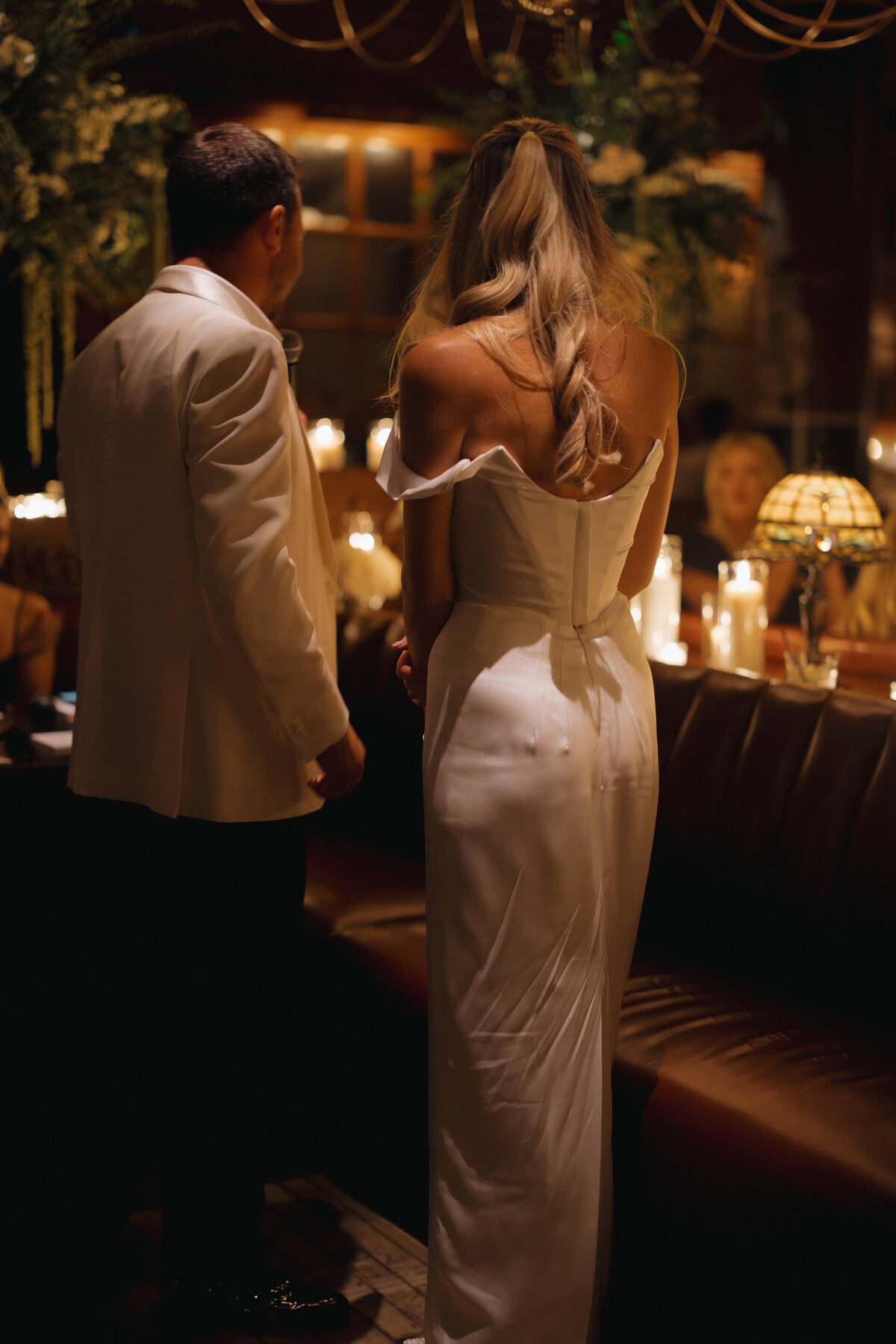 Sophisticated editorial wedding photography captures reception celebration at Trivoli Tavern Chicago, featuring Lauren Alatriste's fashion forward approach combining magazine-worthy imagery with celebration energy and authentic wedding emotion.
