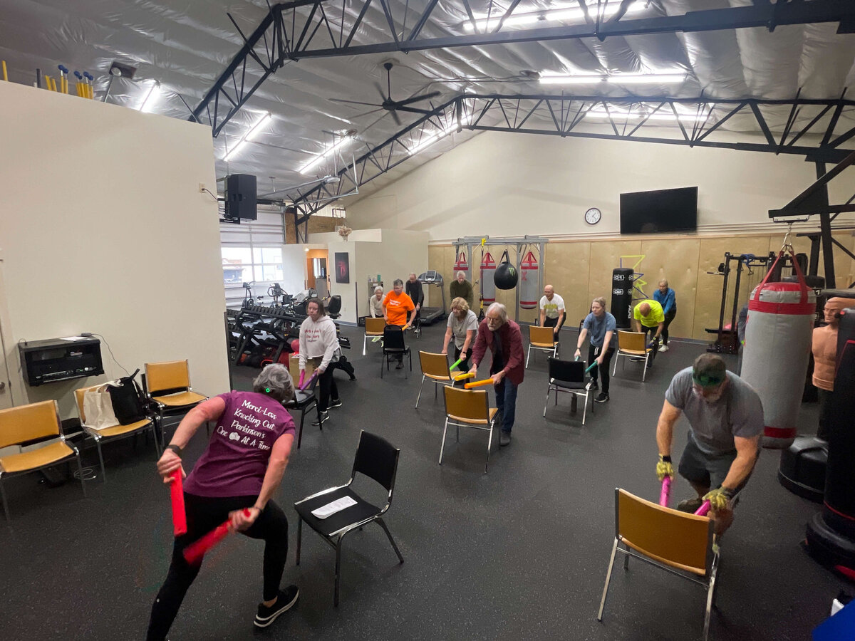 Lori leads parkinsons warriors in a class at  their Eugene gym. 