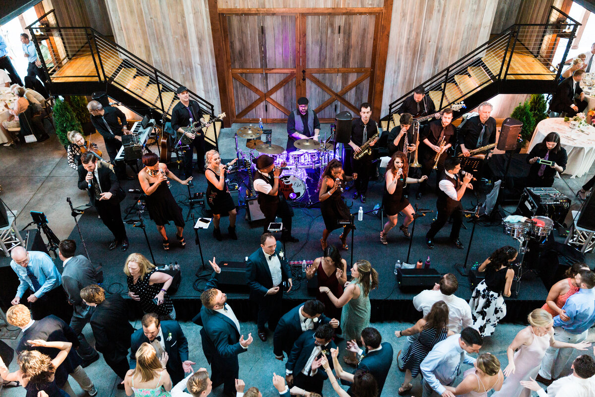 Overhead view of band and wedding guests dancing