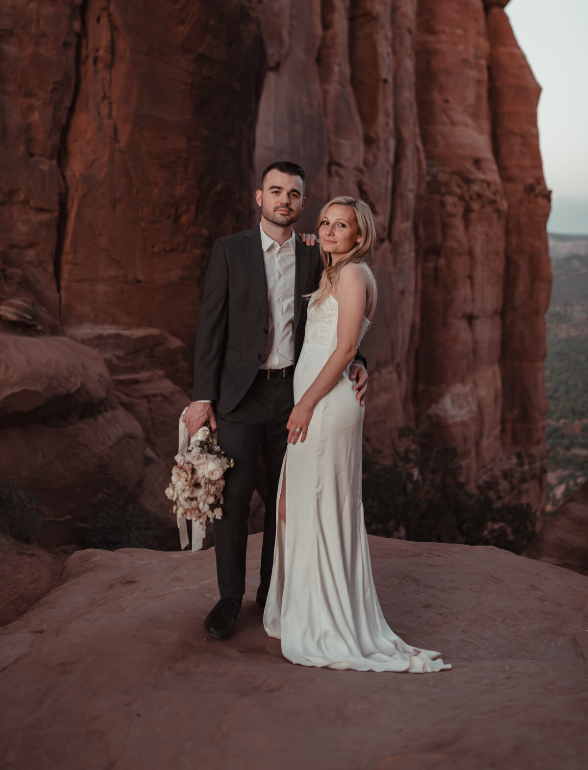 Close-up of hiking boots in red dirt Cathedral Rock Sedona taken by Kollar Photography