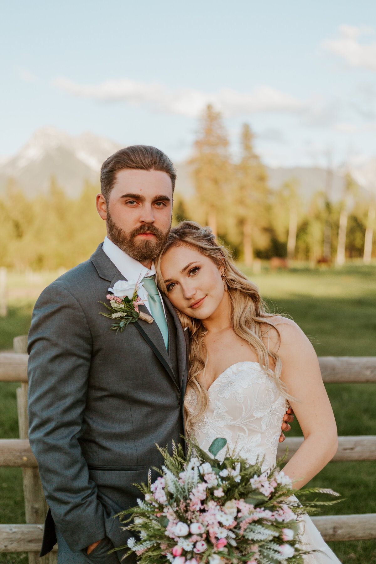 bride and groom posing