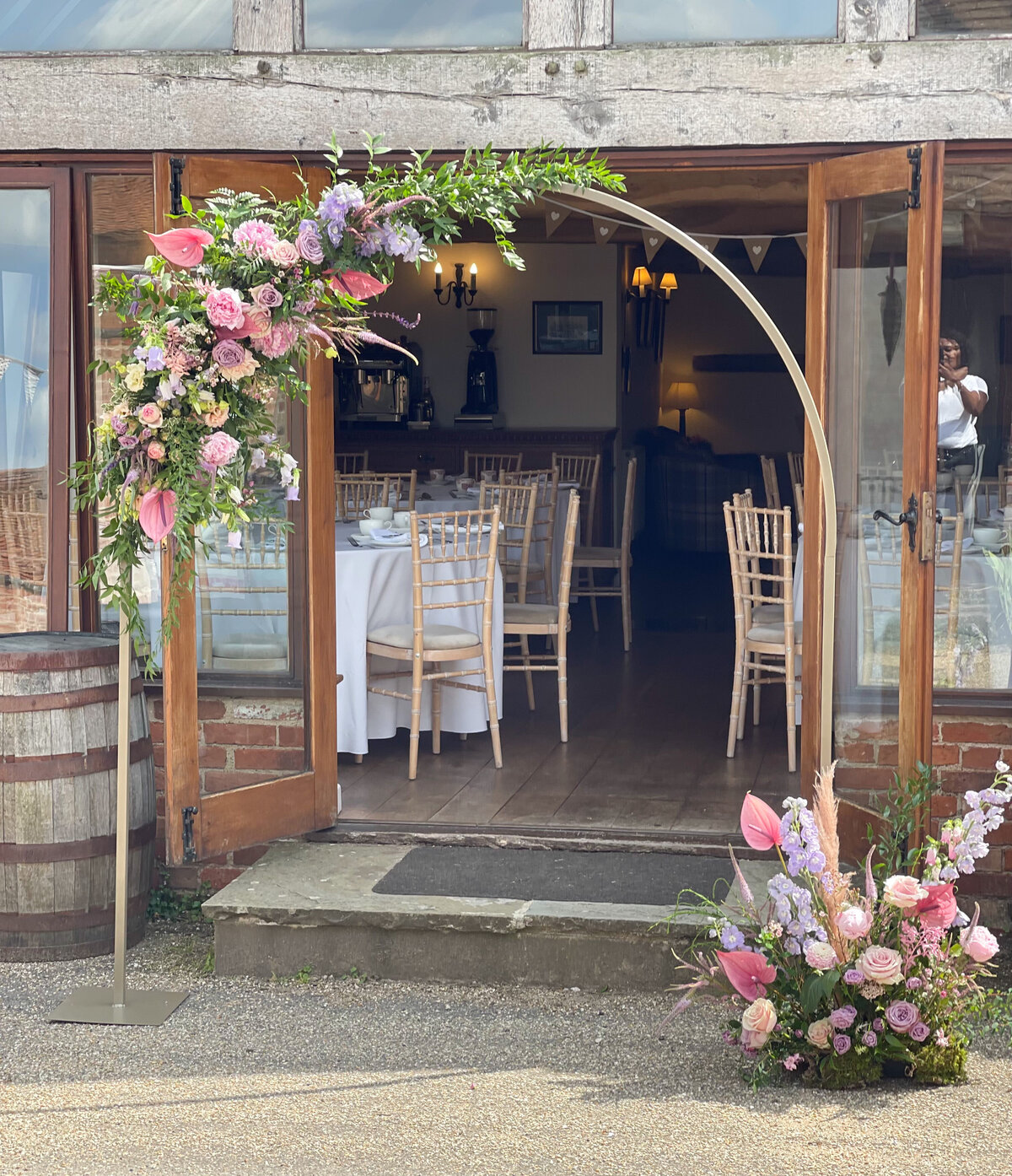 floral wedding arch at venue entrance