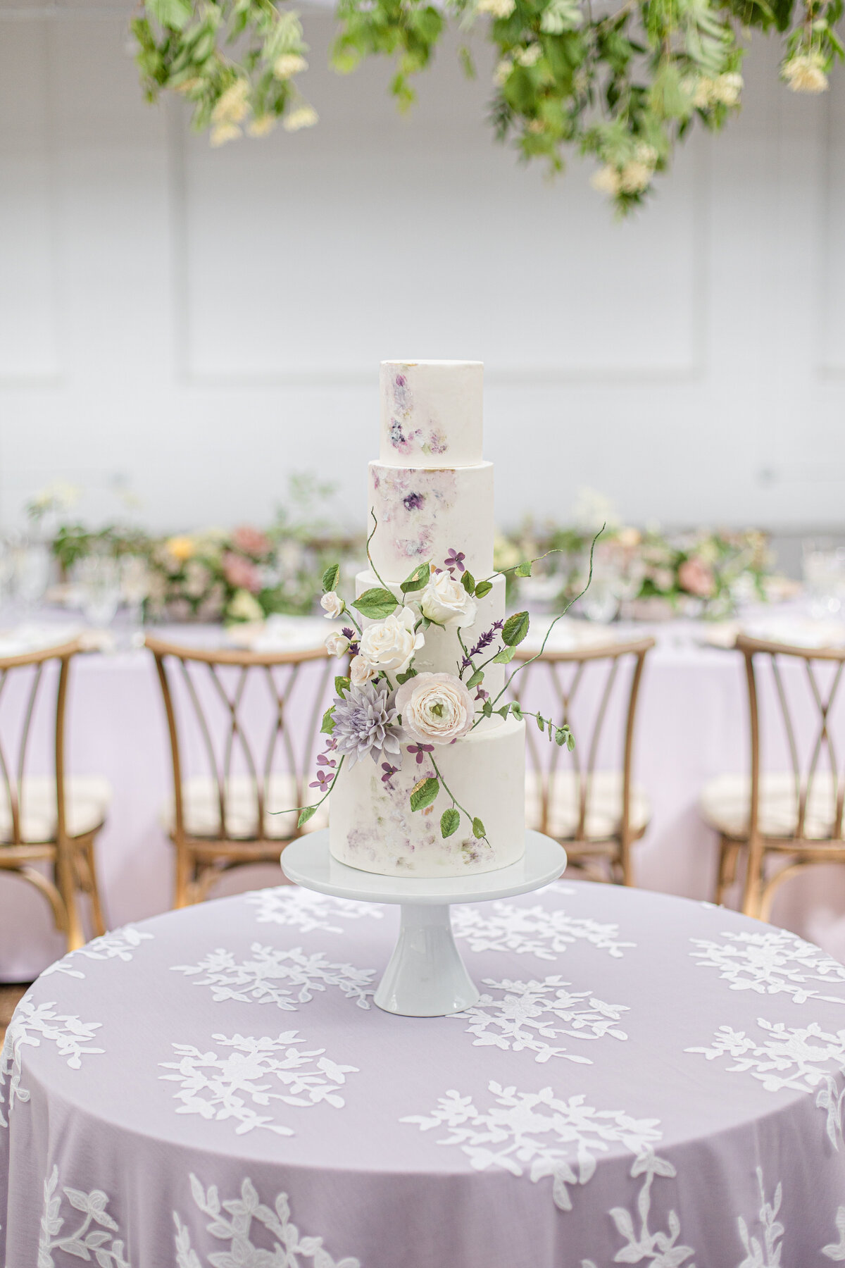 Lavender cake and reception decor in orlando
