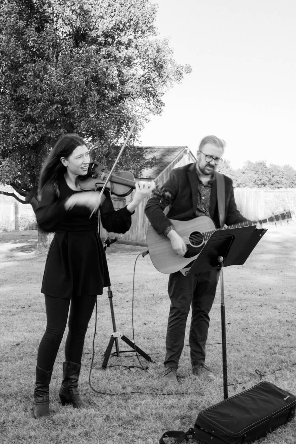 violinst-and-guitarist-playing-music