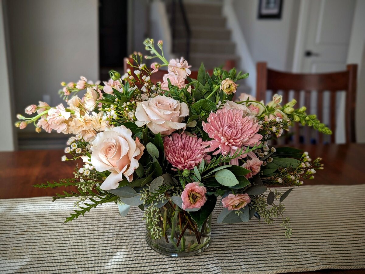 funeral arrangement vase pinks