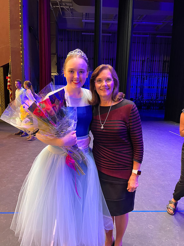 Senior dancer with miss becky after the ballet production