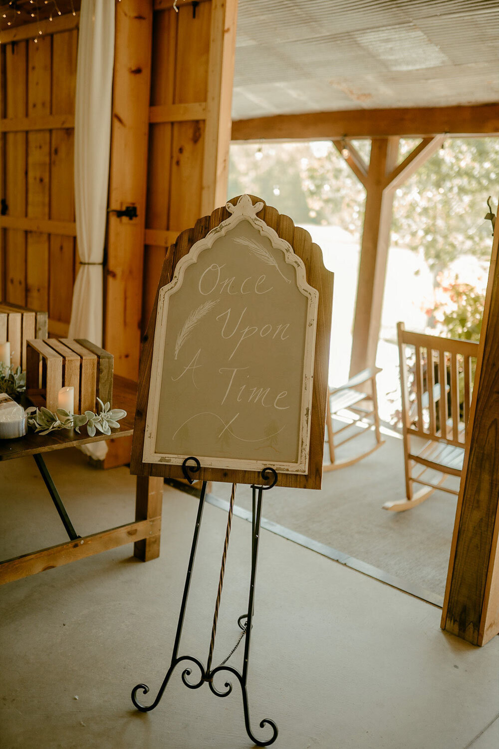 Chalkboard sign reading "Once Upon a Time" on an easel