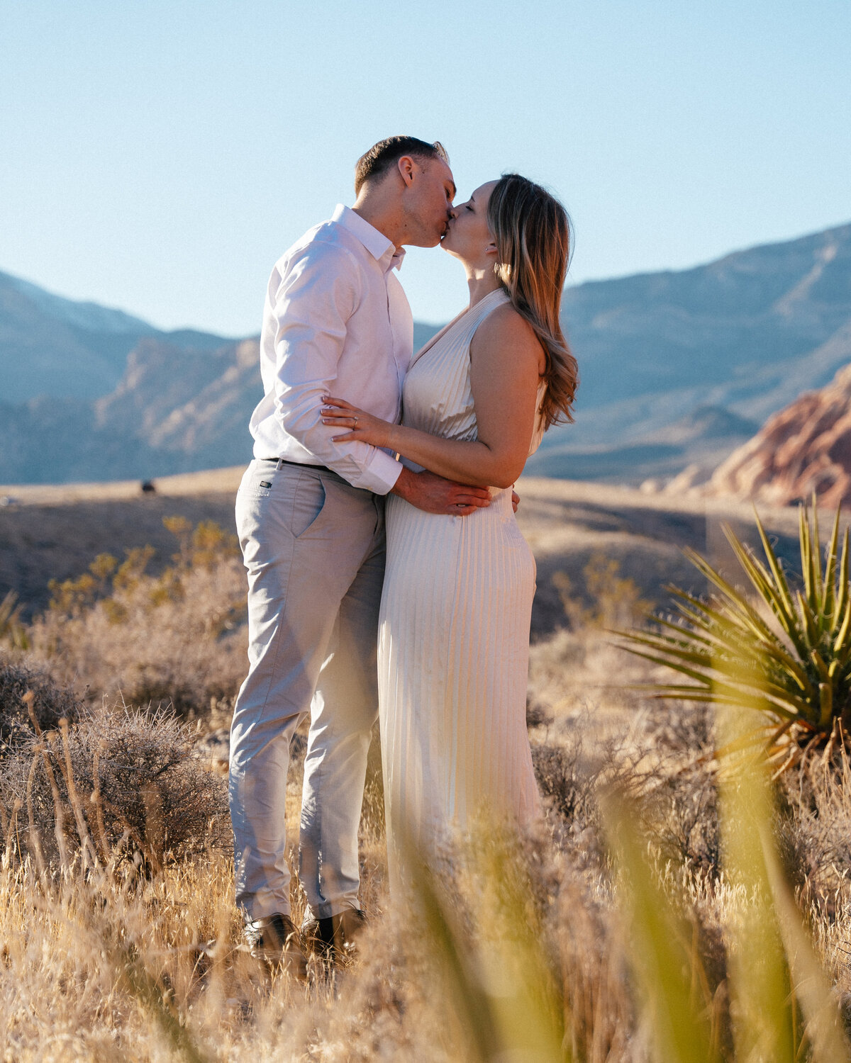 couple kissing in the nevada desert just outside of las vegas