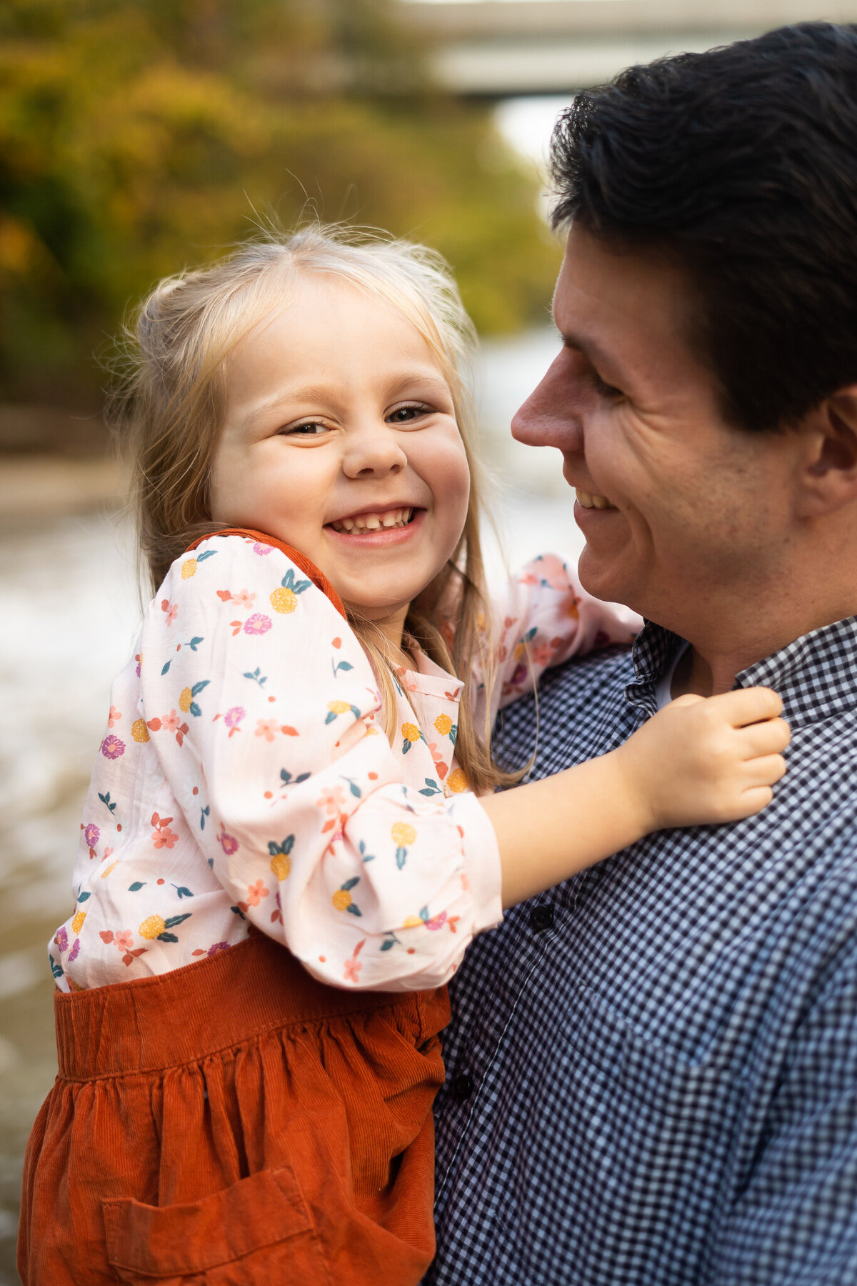 child laughing during fall family session Cleveland