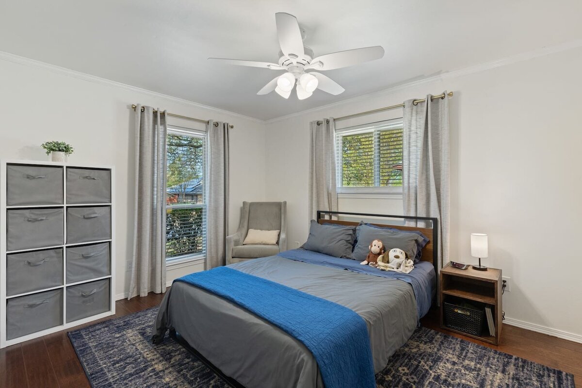 10216_shadow_way_dallas_tx_secondary_bedroom_with_natural_light_and_storage_haven_realty_group