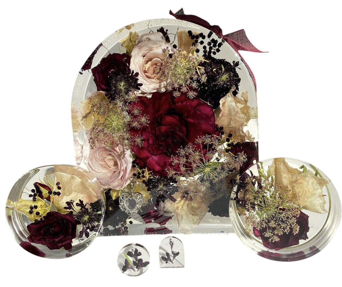 arch resin blocks with burgundy and pink wedding bouquet preserved as family keepsake