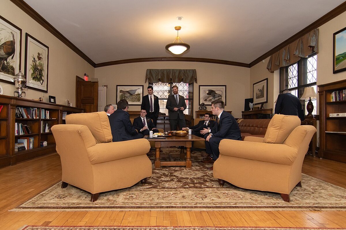 Groom and Groomsmen relaxing in the study before his wedding at University Club in Pittsburgh, PA
