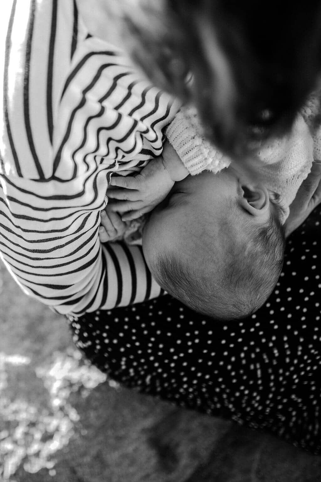 Mother-feeding-young-baby-at sydney-beach