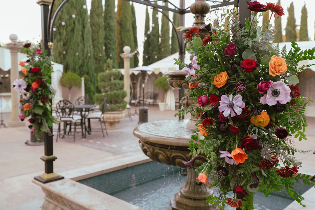 gazeboo flowers at the grand island mansion patio fountain