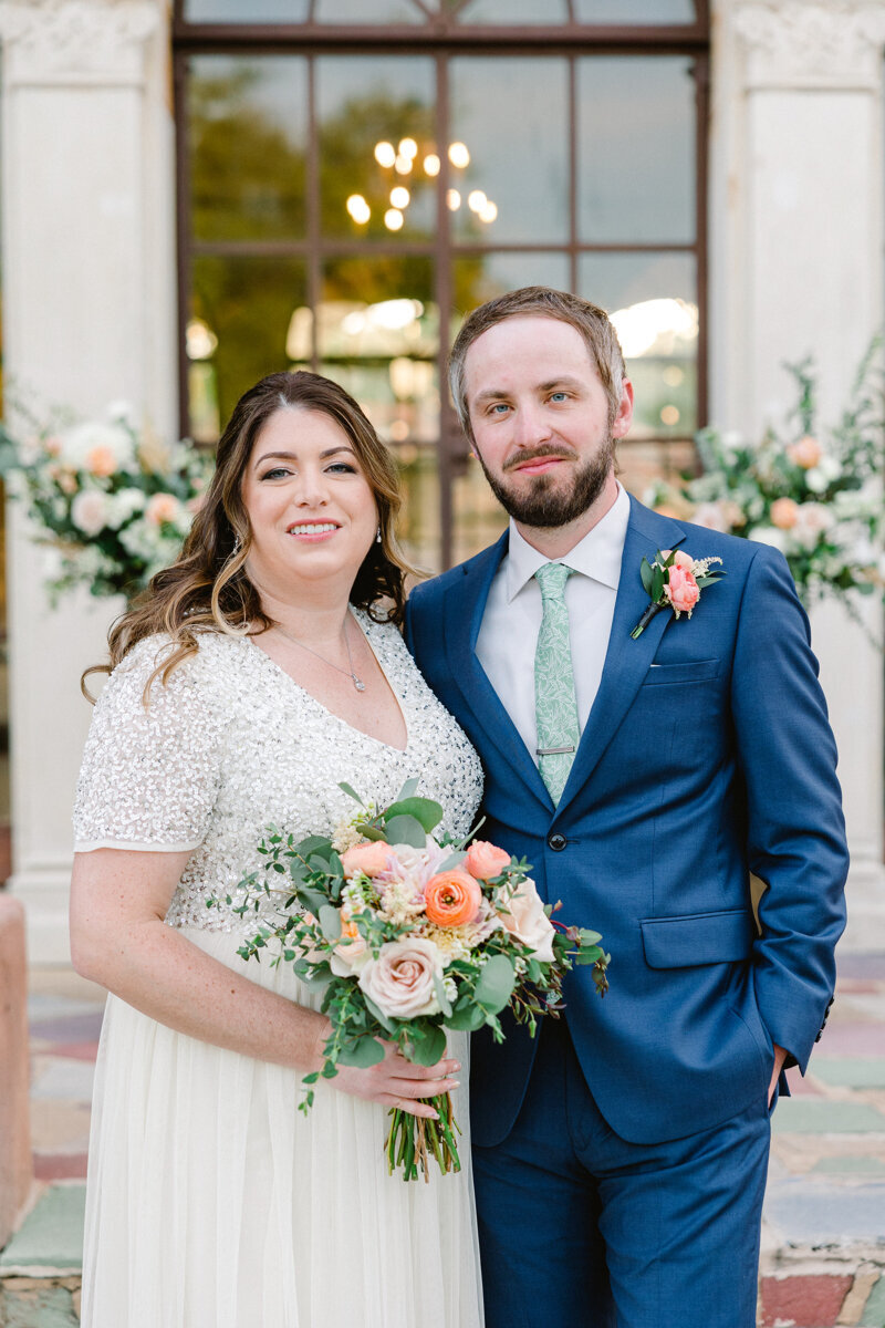 couple portrait smiling at camera