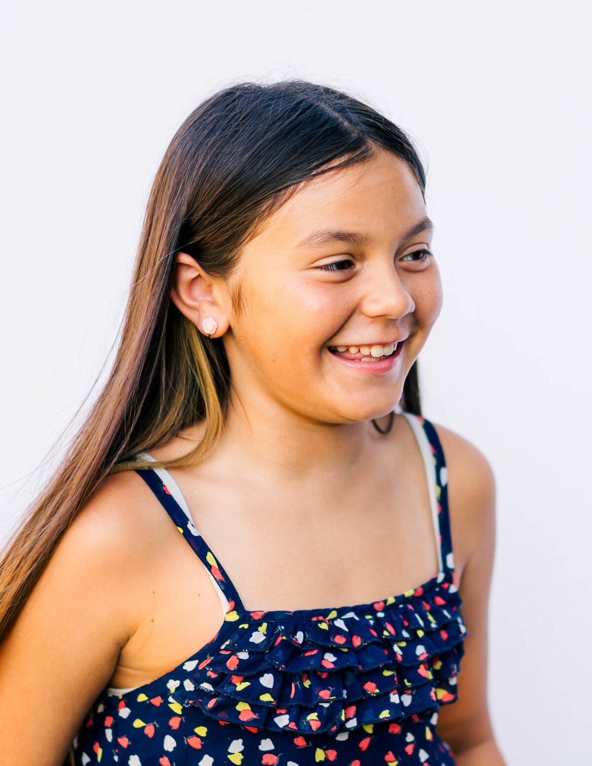 A joyful fine art boutique portrait session with a student