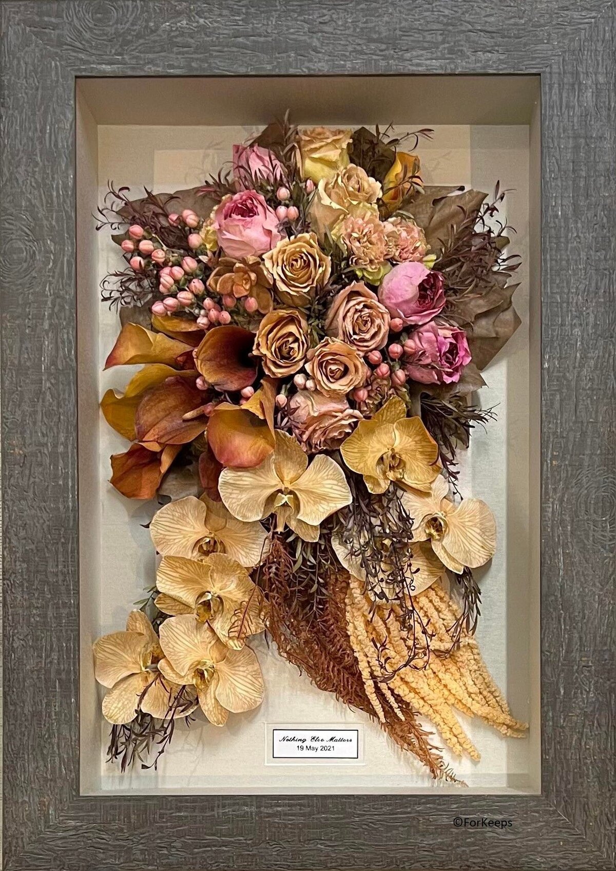 Wedding bouquet preserved in 3D frame.