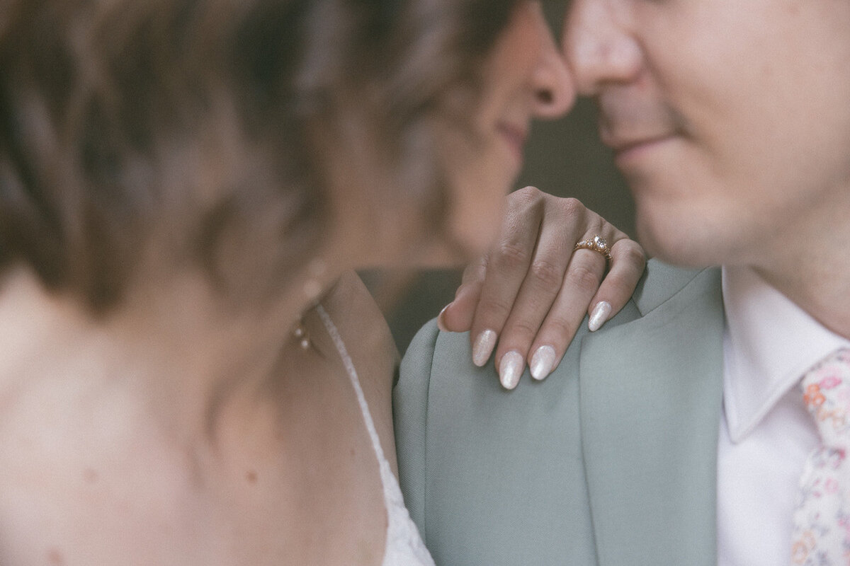 Couple goes nose to nose in a romantic moment on their elopement day in Yosemite, CA.