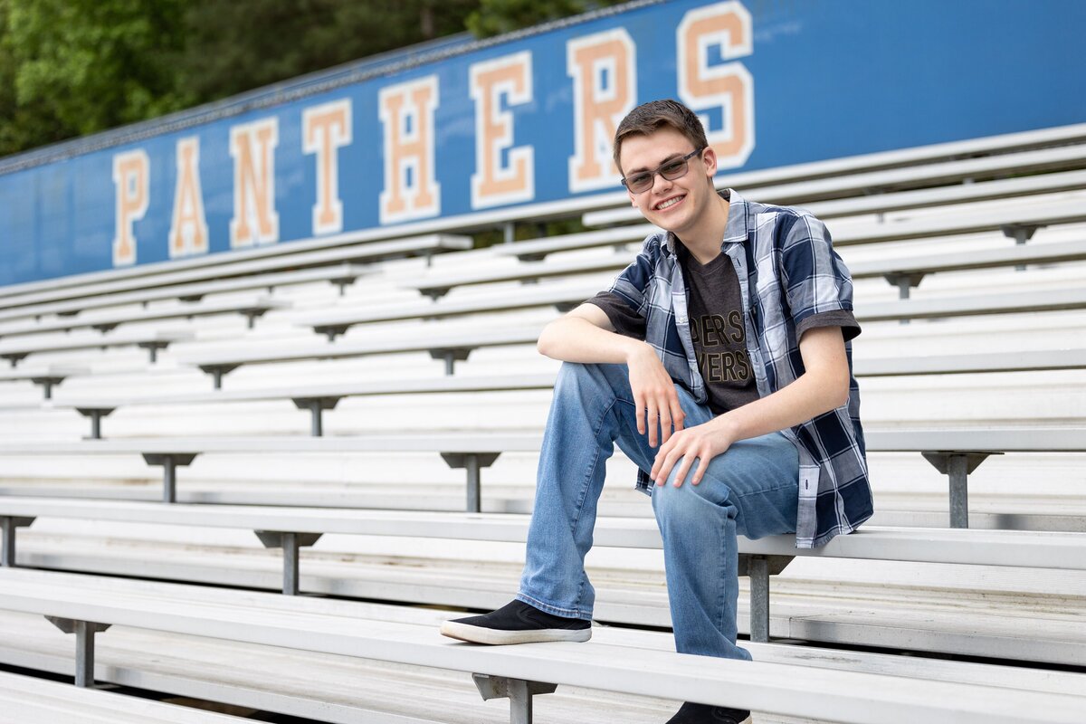 Parkview High School boy sitting on bleachers