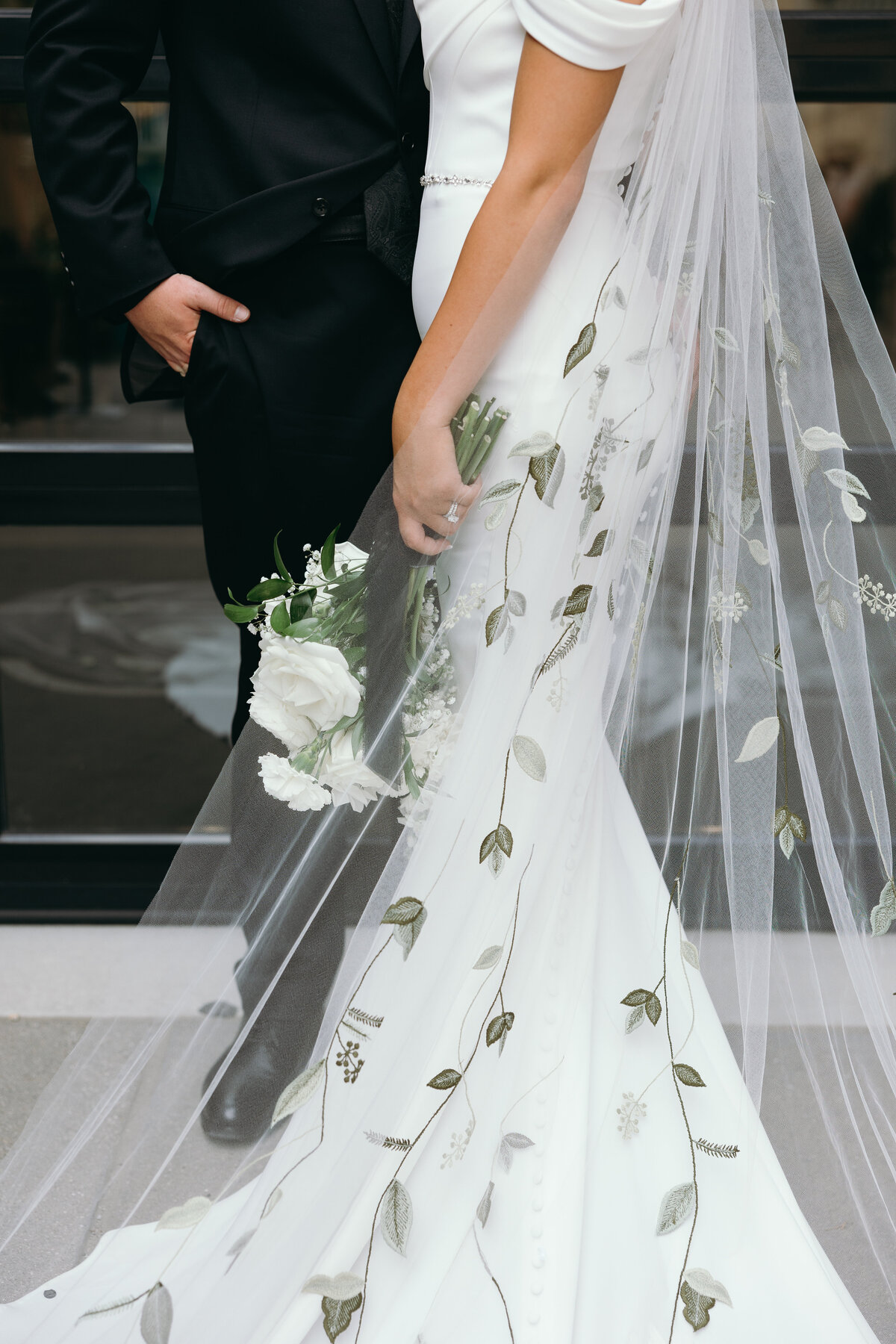 Ryann photographing a couple, bringing authenticity and warmth to wedding photography in Indiana and beyond.