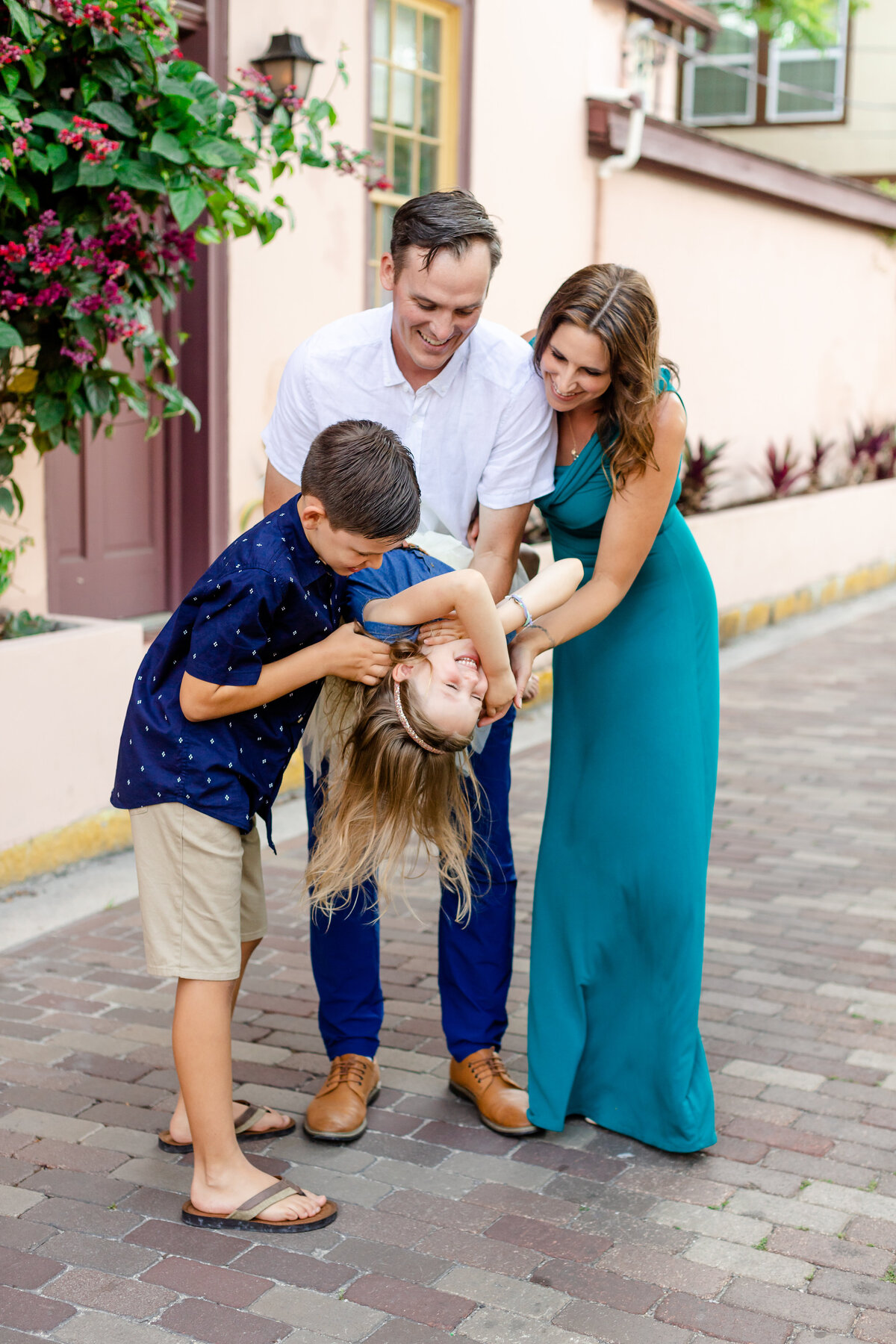 Family laughing at a family session in St Augustine Florida