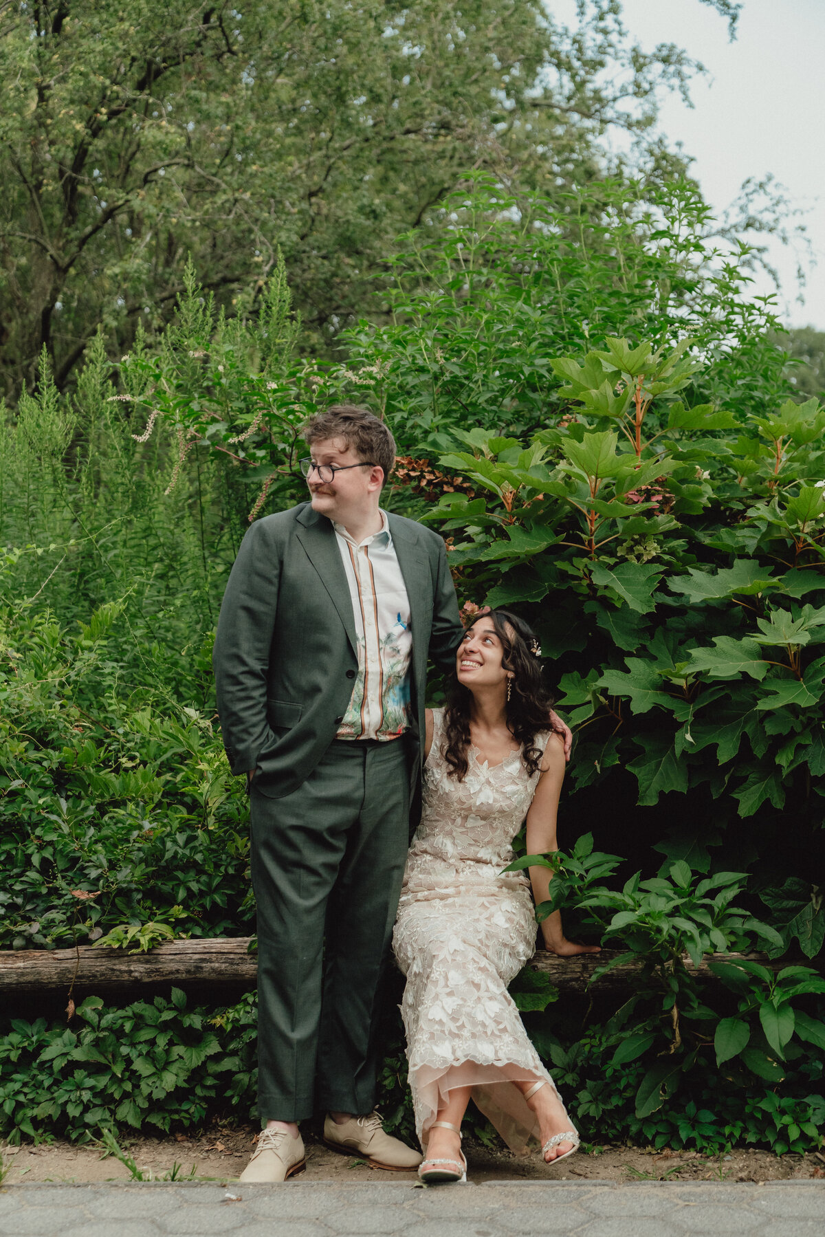 bride and groom looking to the side in prospect park, brooklyn