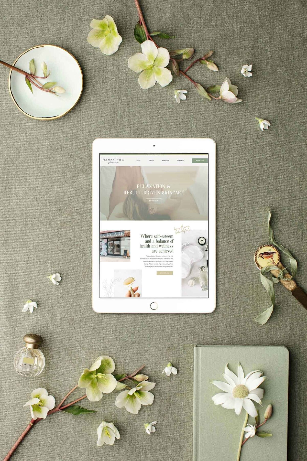 Step into a world of calm hues and delicate details with a salon website displayed on an iPad, showcasing the soothing atmosphere of custom web design.