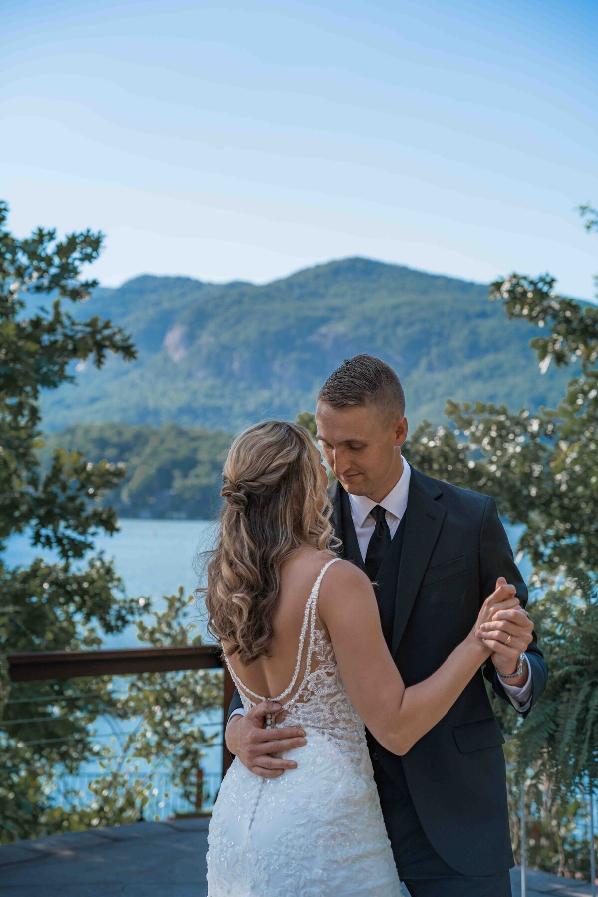newlyweds during their first dance at lake lure in north carolina