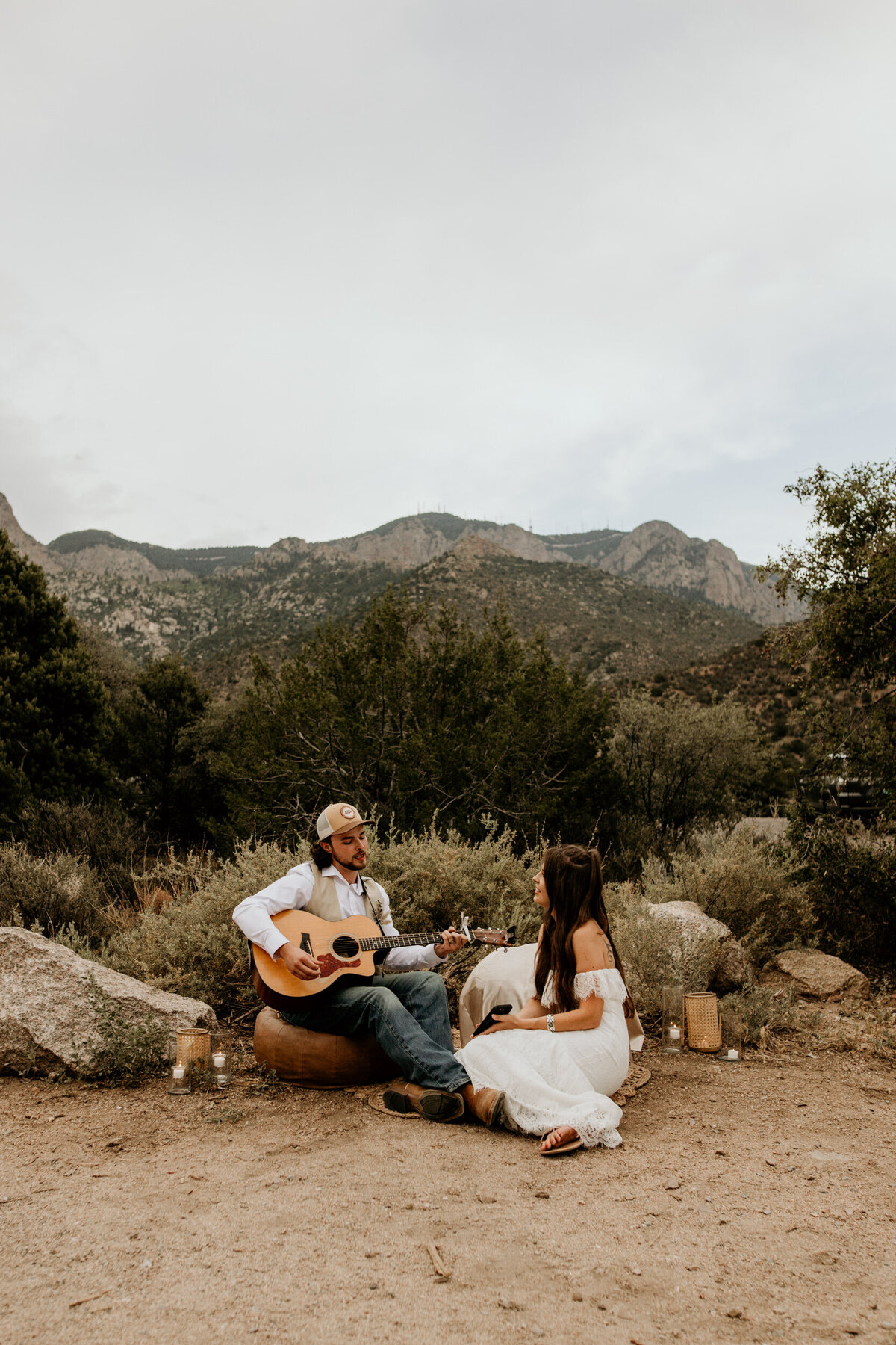 groom singing to new wife and playing guitar at the Albuquerque foothills